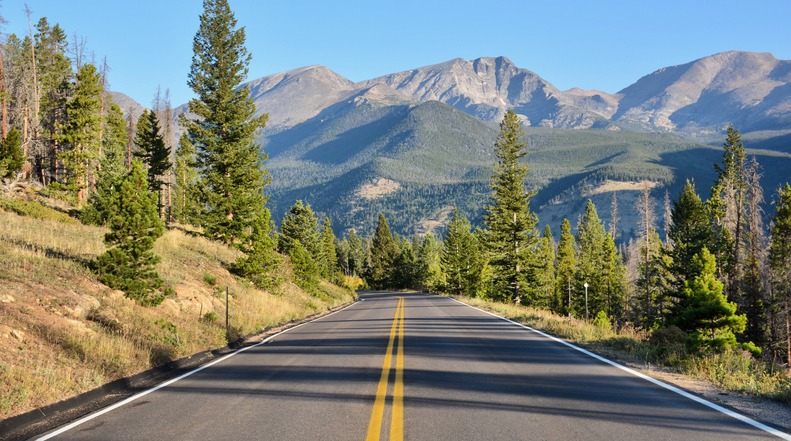 Attorney reviewing notes on a Colorado roadway collision claim