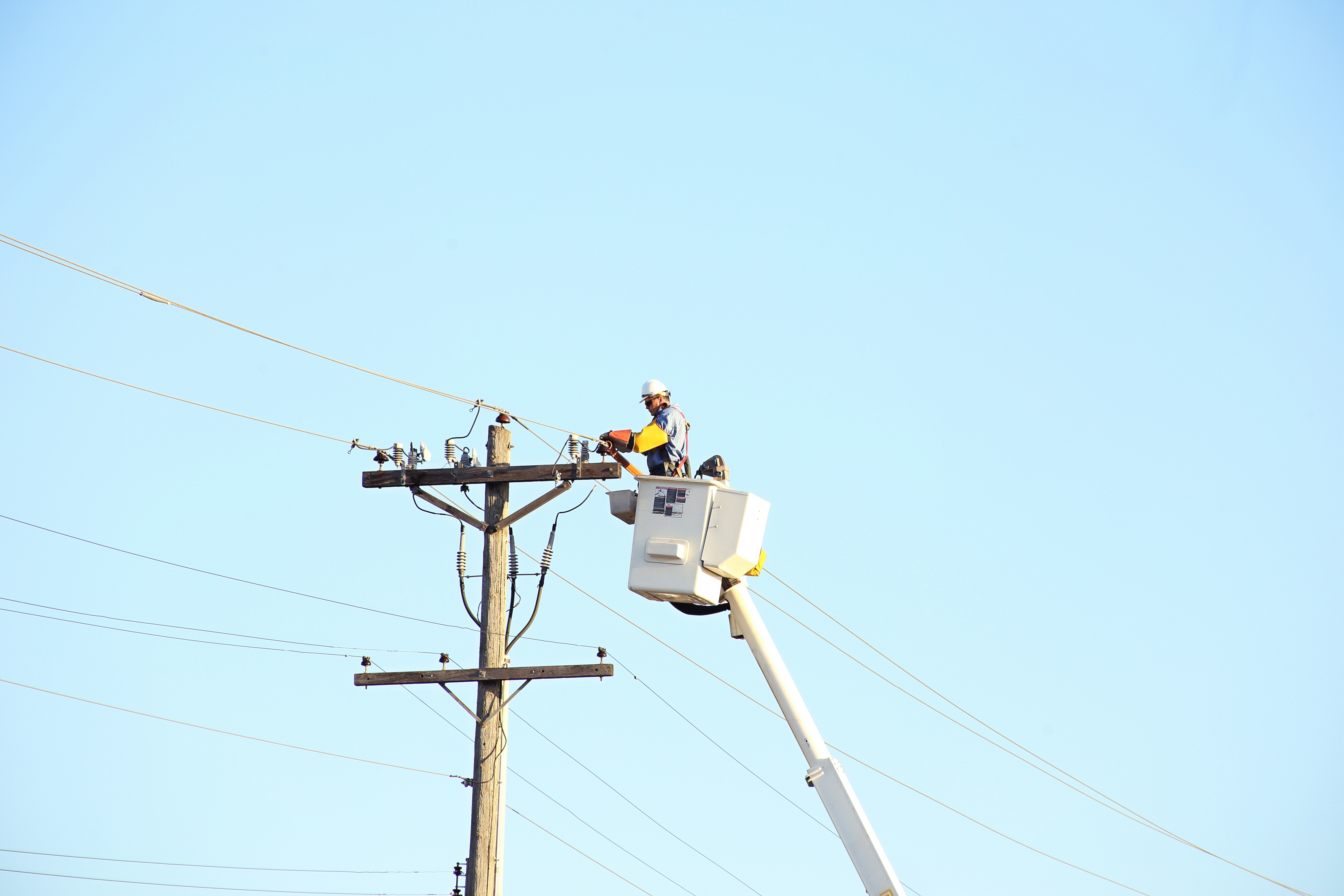 Licensed electrician working calmly at a residential panel