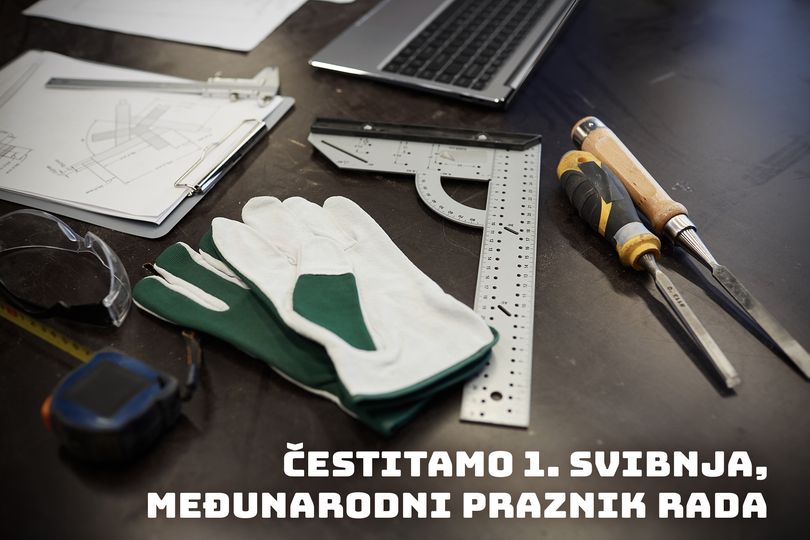 Close-up of table with document laptop and work tools preparing for manual work