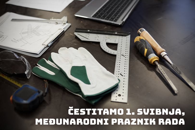 Close-up of table with document laptop and work tools preparing for manual work